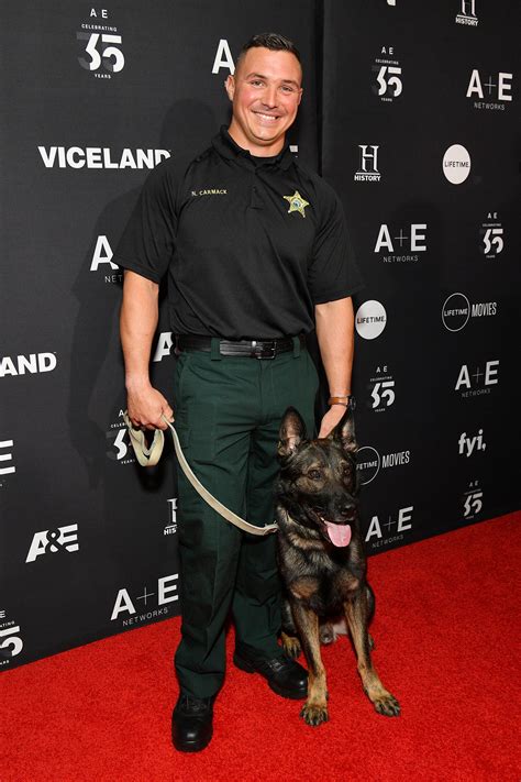 Deputy Nick Carmack and Shep of A&E&x27;s Live PD attend the 2019 AE Networks Upfront at Jazz at Lincoln Center on March 27, 2019 in New York City. . Nick carmack pasco county